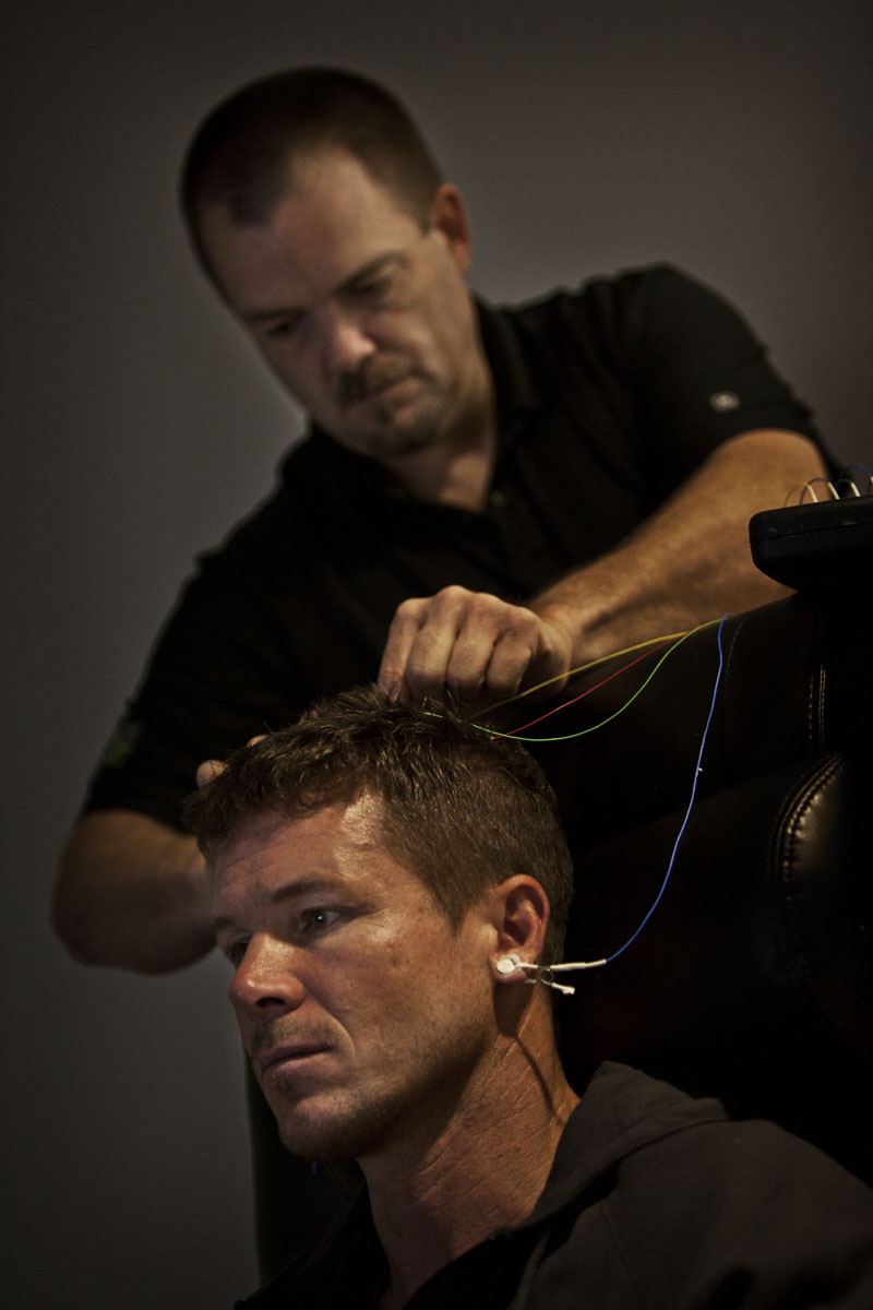 Bryan Hixson adjusting EEG sensors during Felix Baumgartner’s training